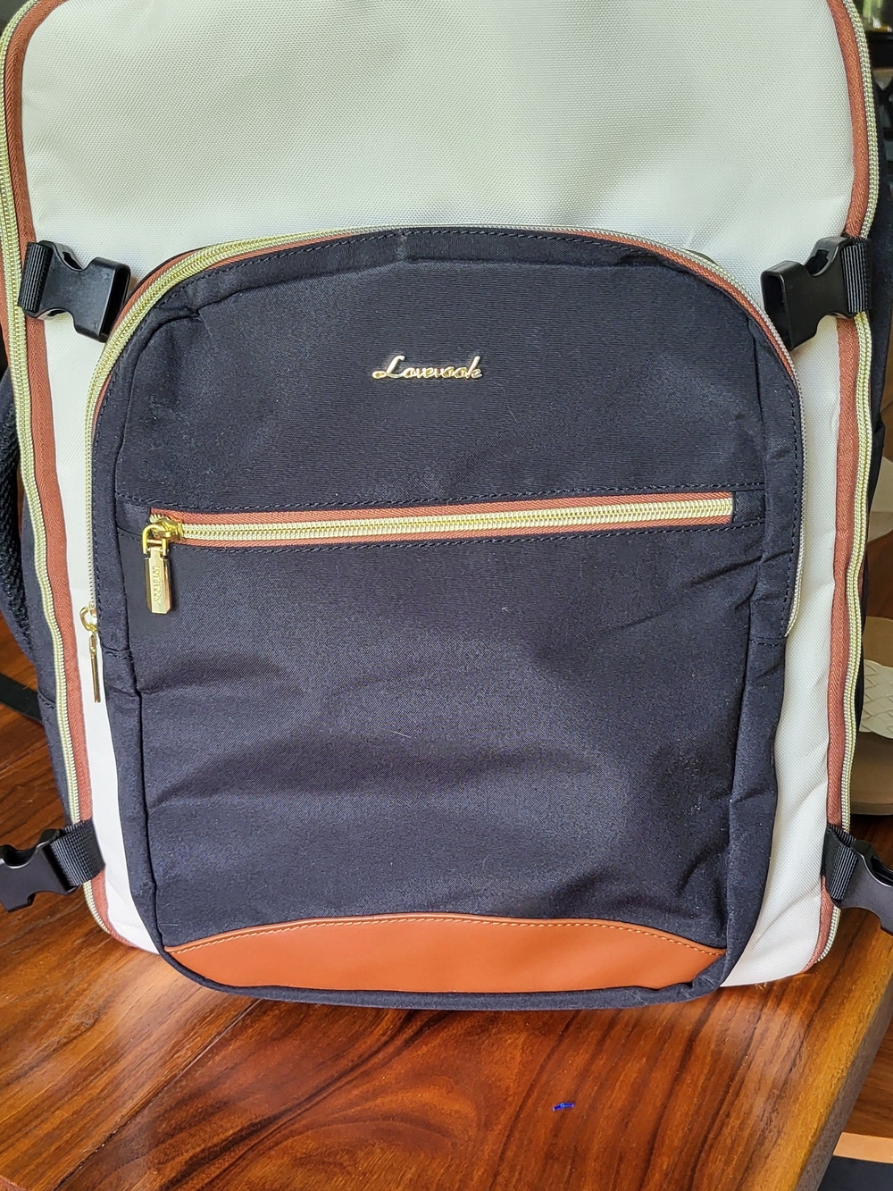 Black and White Lovehook Backpack with Brown Accents